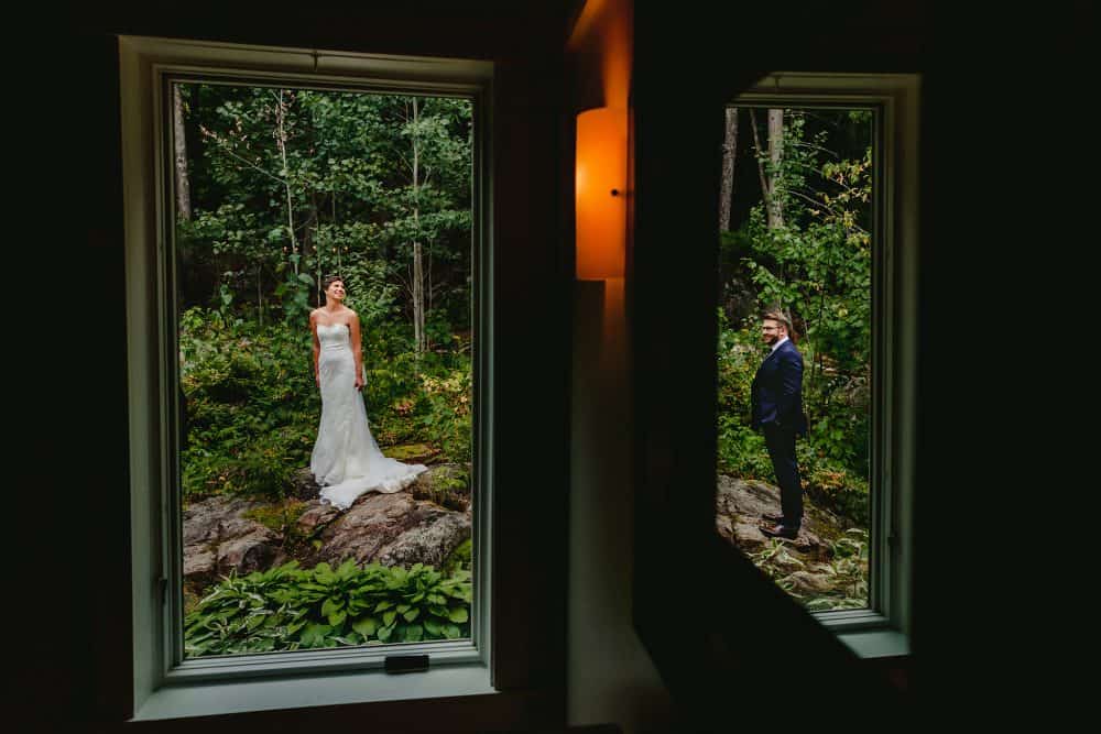 bride and groom window reflection portrait