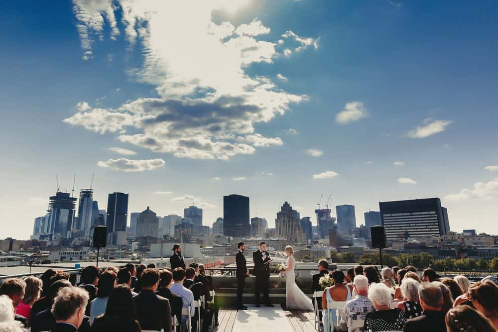 outdoor wedding ceremony with Montreal skyline