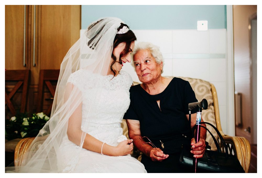 Sweet moment between a bride and her grandma