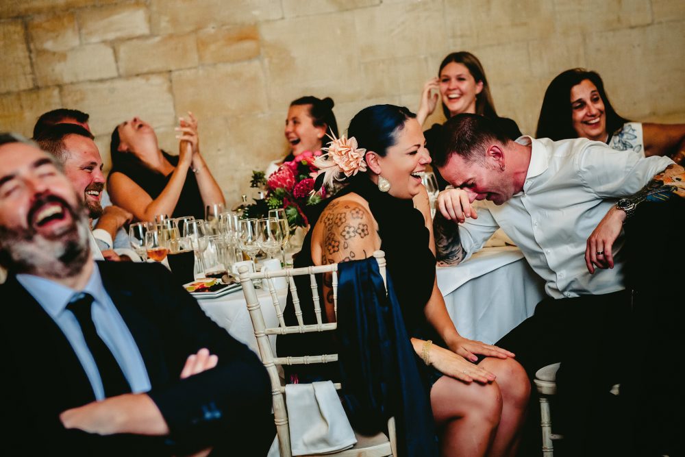 wedding photography coverage of guests laughing