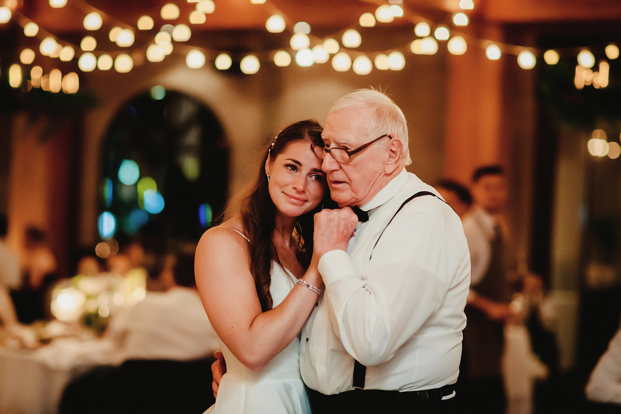Bride getting emotional dancing with grandfather