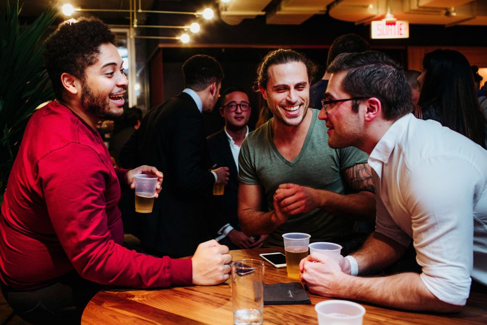 A group of men enjoying a drink