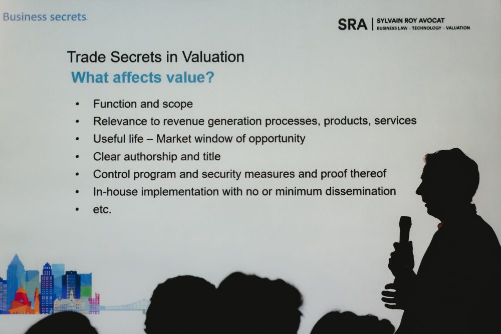 A powerpoint presentation at a corporate event.