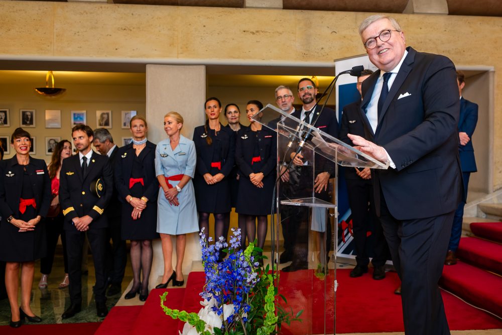 A man looking into the camera at an event.
